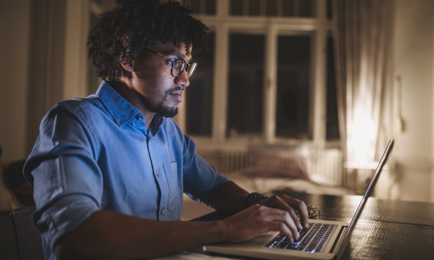 Man working on computer.