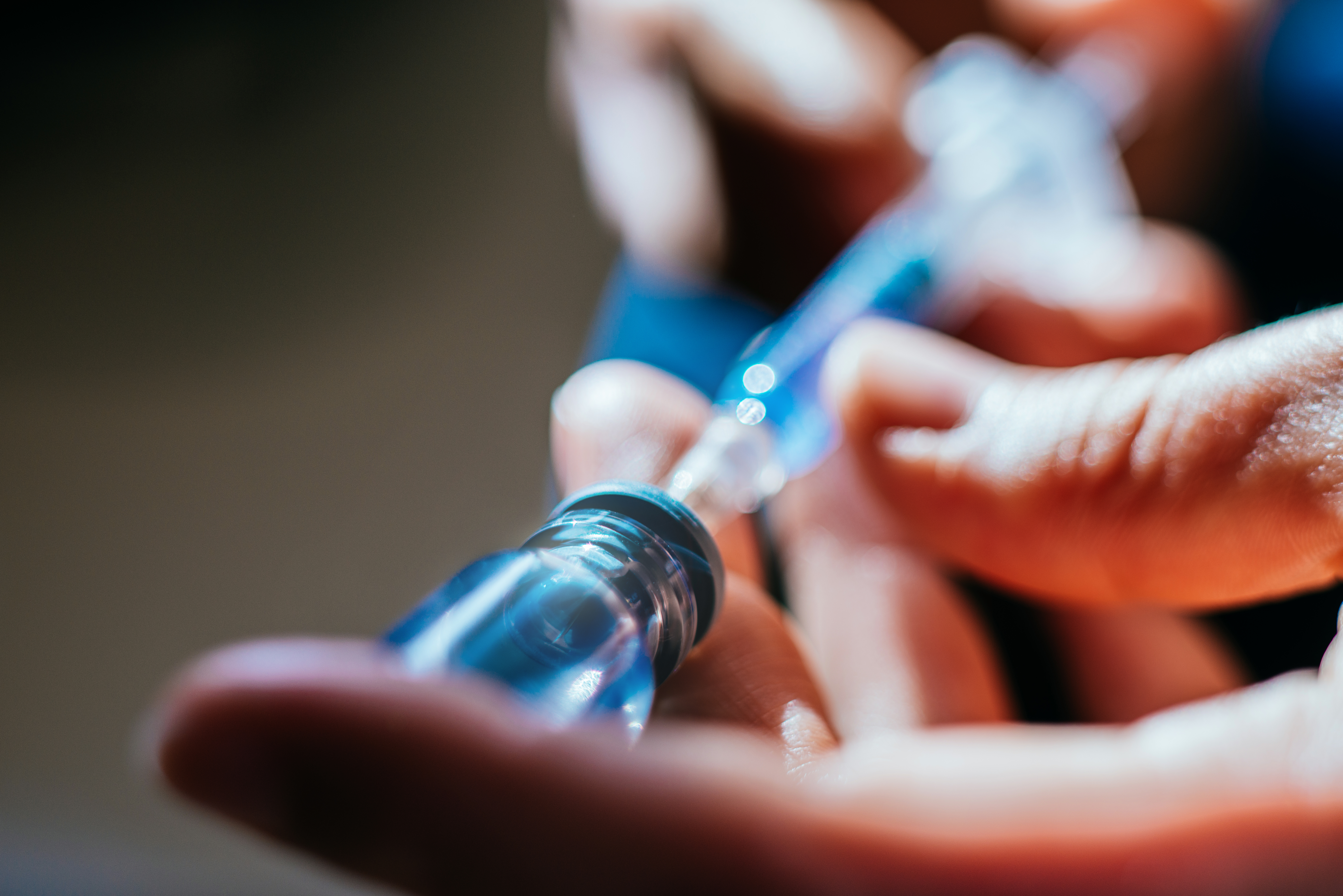 Nurse preparing injection