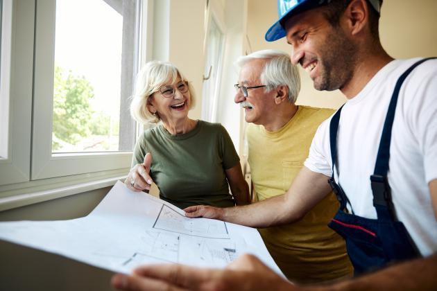 Senior couple working with contractor